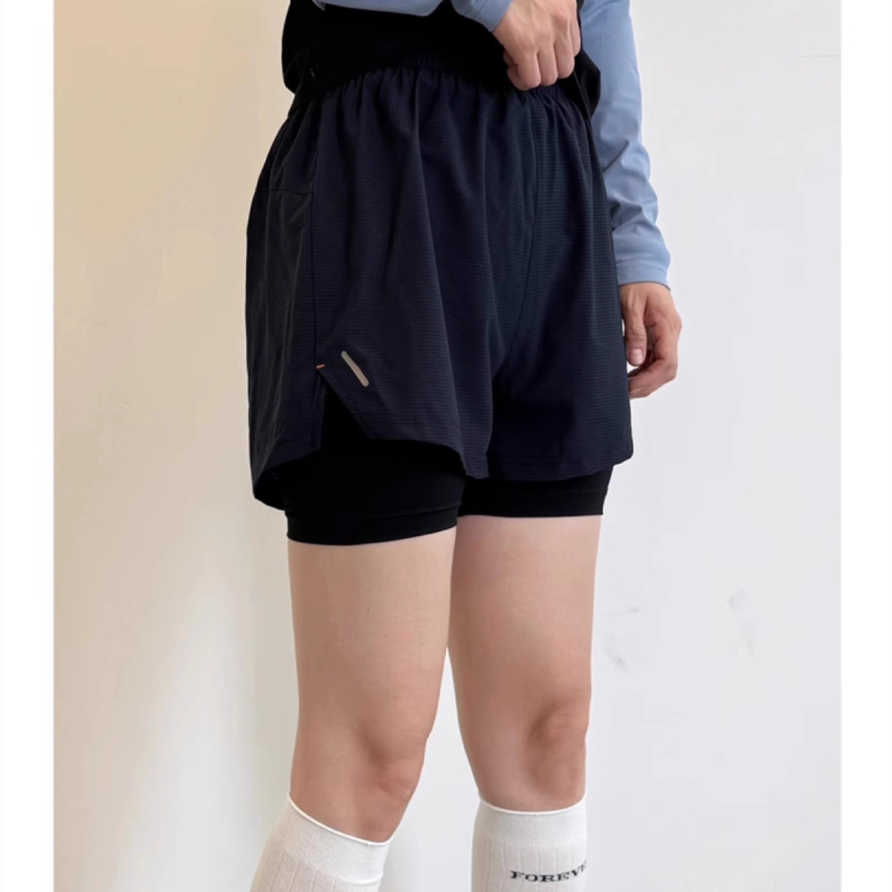 Pantalones cortos deportivos 2 - Running Gear Junior reseña y precio